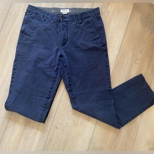 Men’s navy slim tapered Dockers pants.